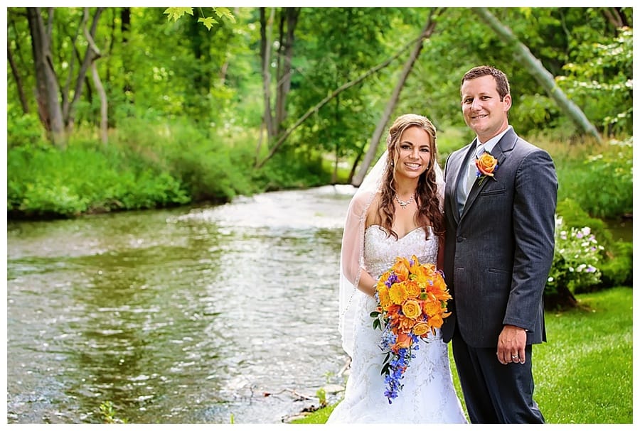 Bride and Groom by River at Riverside Receptions
