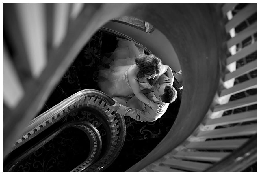 Bride and groom in stairwell