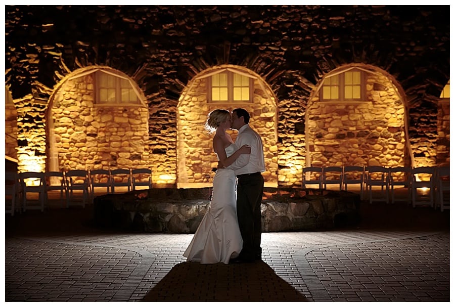 Night time photograph of bride at groom at castle farms