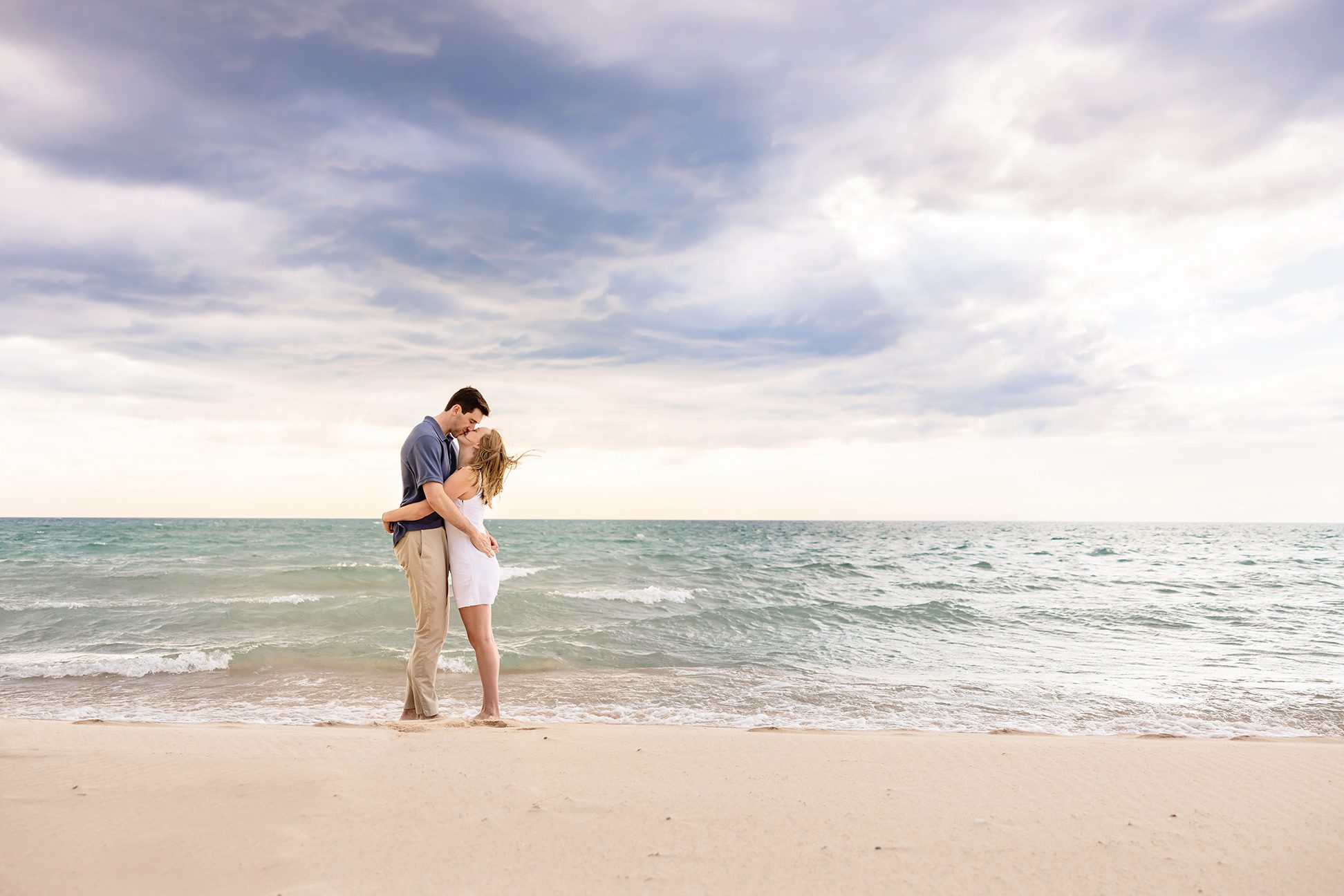 Couple just engagement on Lake Michigan by Lake Bluff Preserve