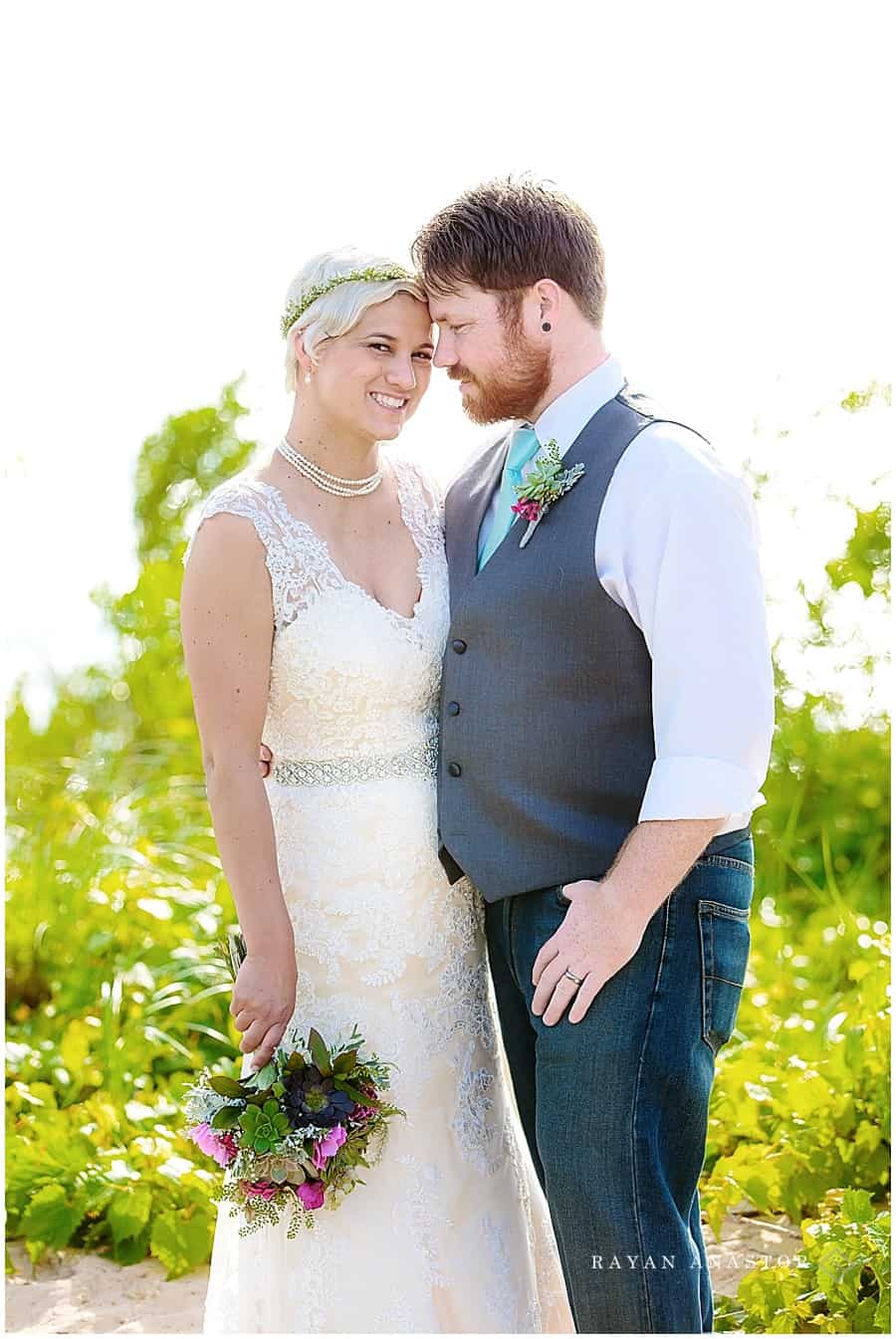 bride and groom after beach wedding