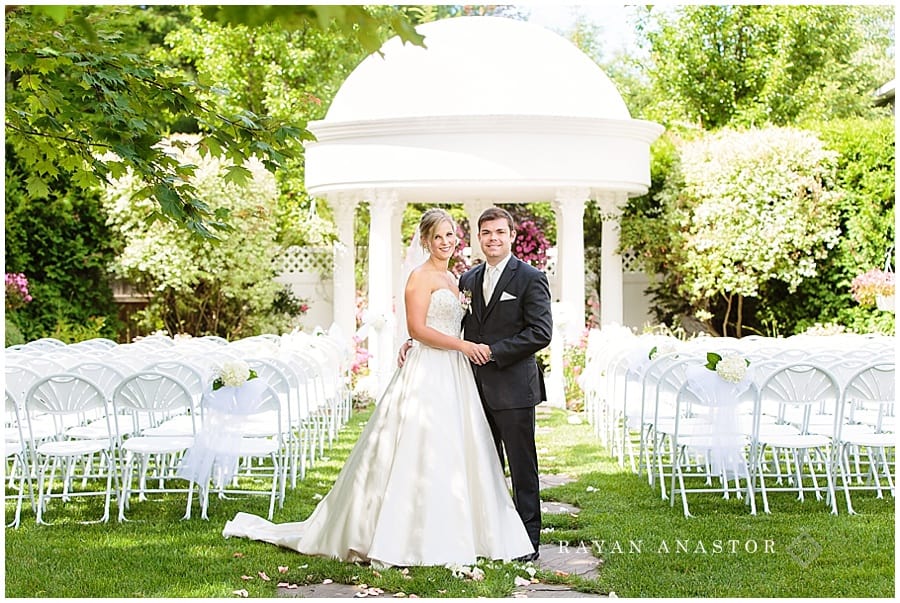 bride and groom in garden at greystone mansion