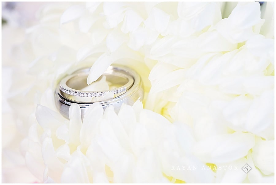 Wedding rings in bridal flowers by victorias floral design