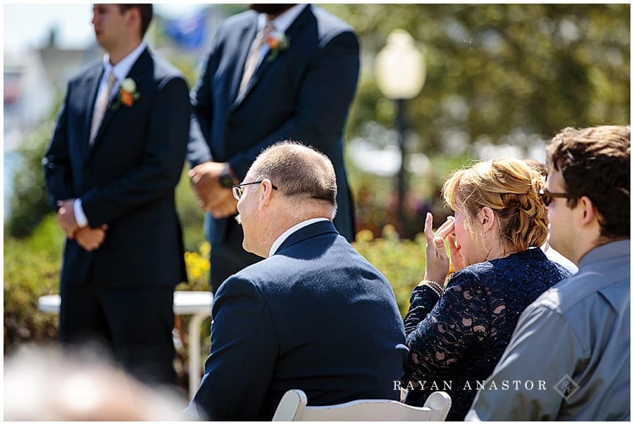 mother of the groom tearing up at wedding