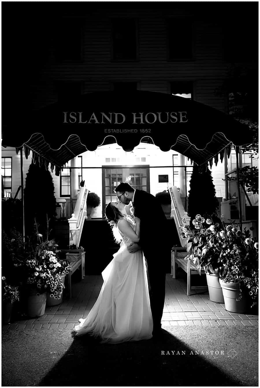 night time photo of bride and groom at the island house