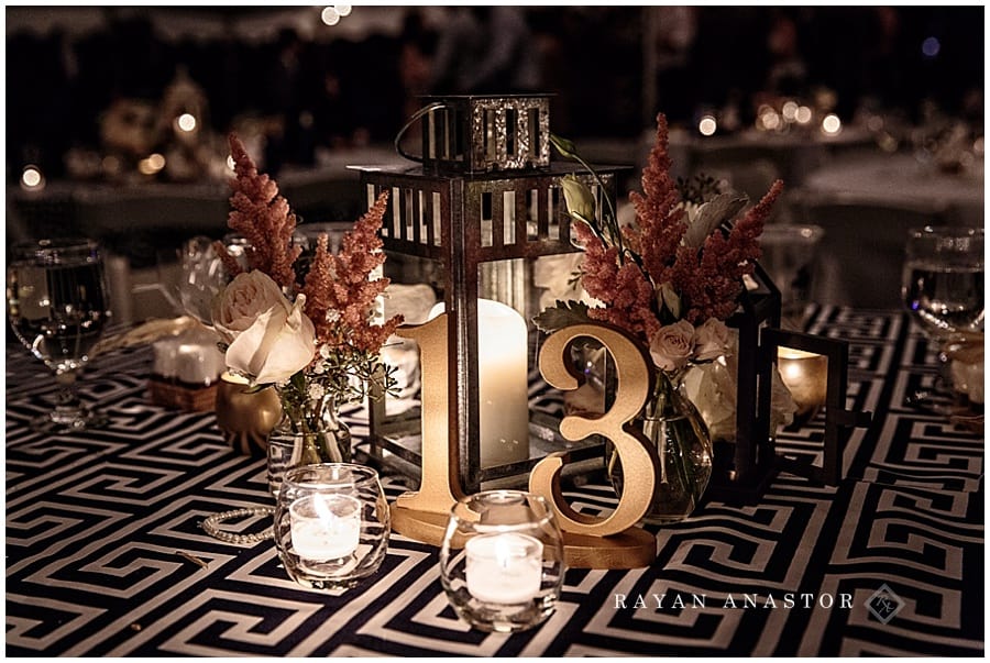 table setting by candle light from smitten events at the red shutter