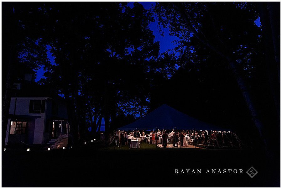 red shutter wedding venue in harbor springs at night