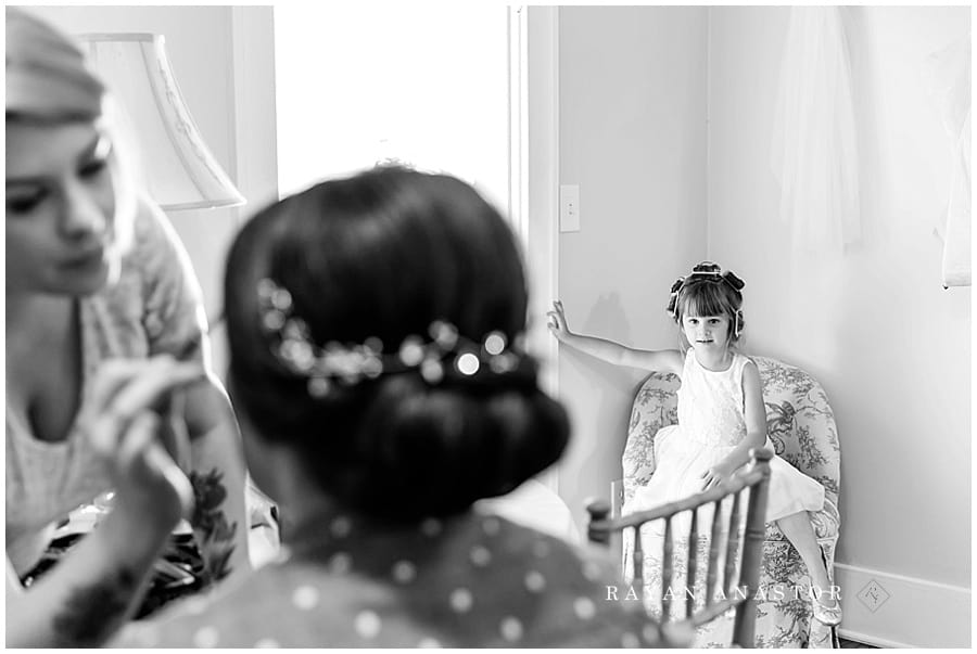 flower girl watching bride get ready at Cornman Farms