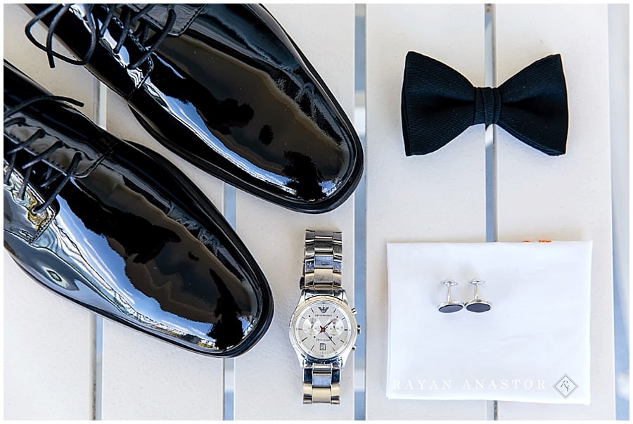 Grooms details with tux and bow tie