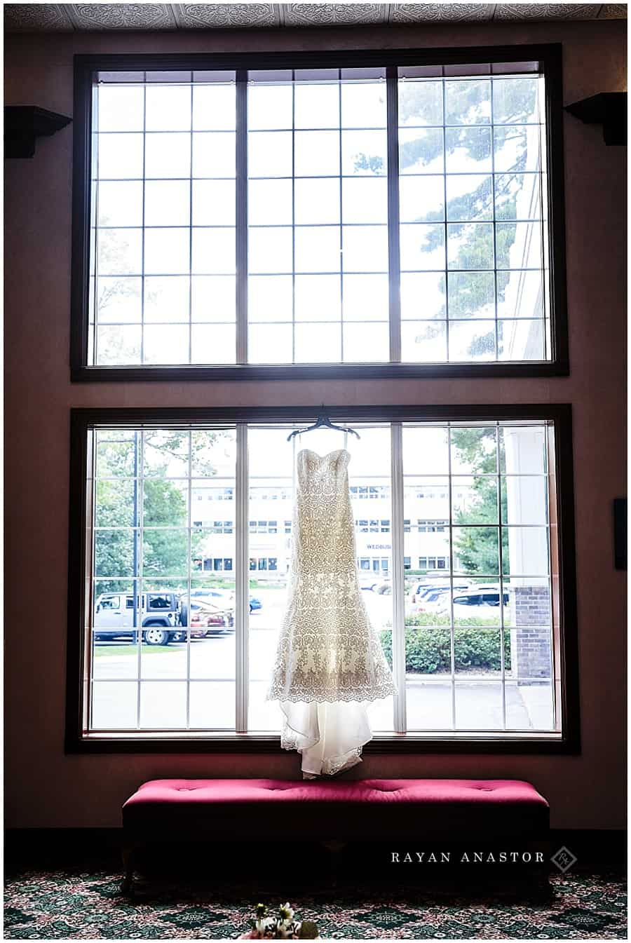 wedding gown in large window