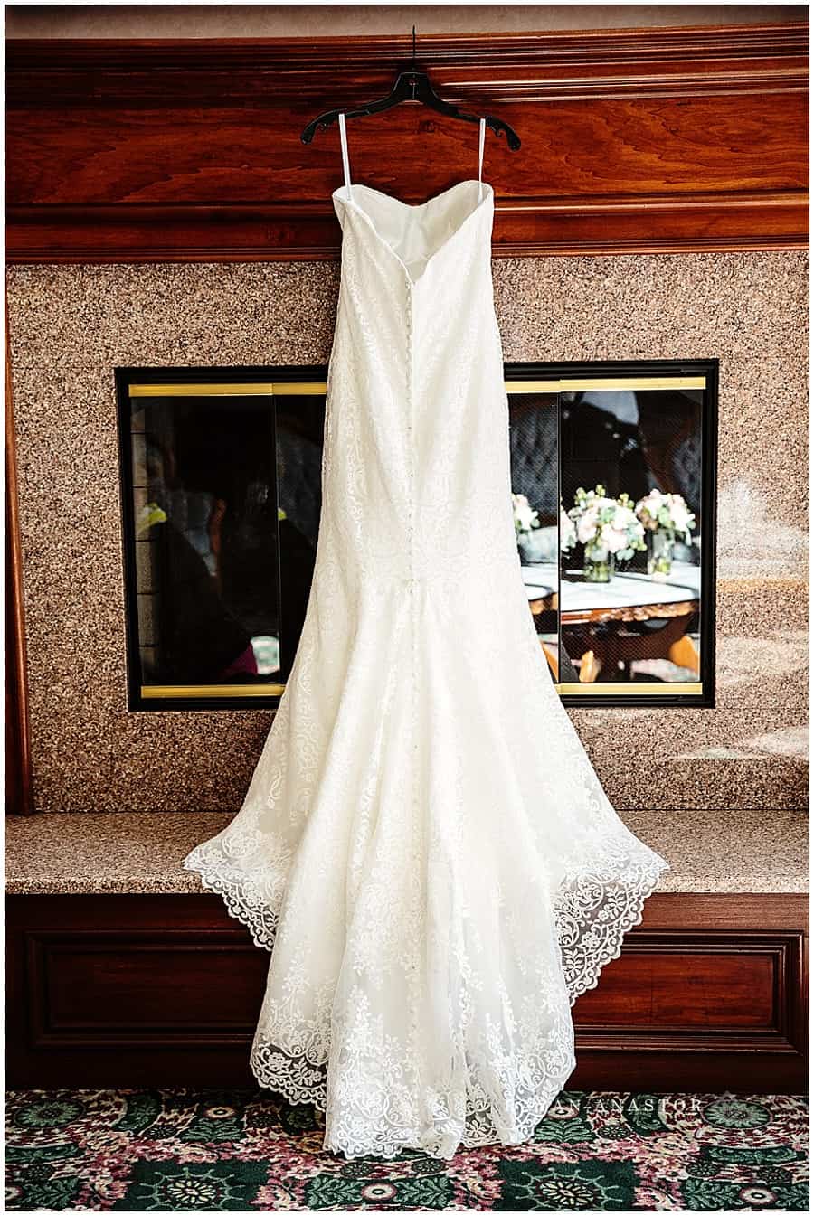 wedding gown at fire place