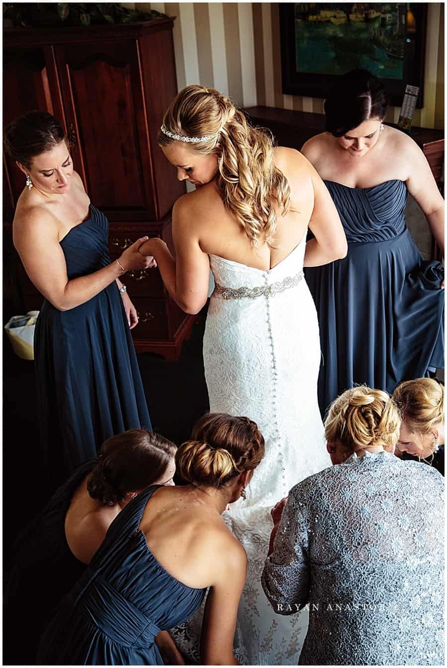 bridal party dressing bride