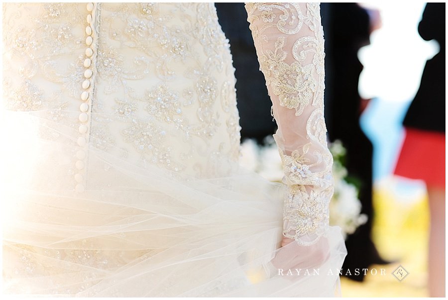 bride holding her very long veil