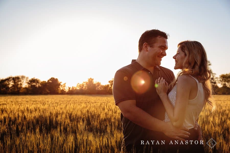 Couple at sunset in wheat field