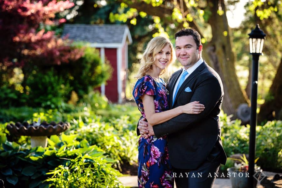 couple in garden for engagement photos