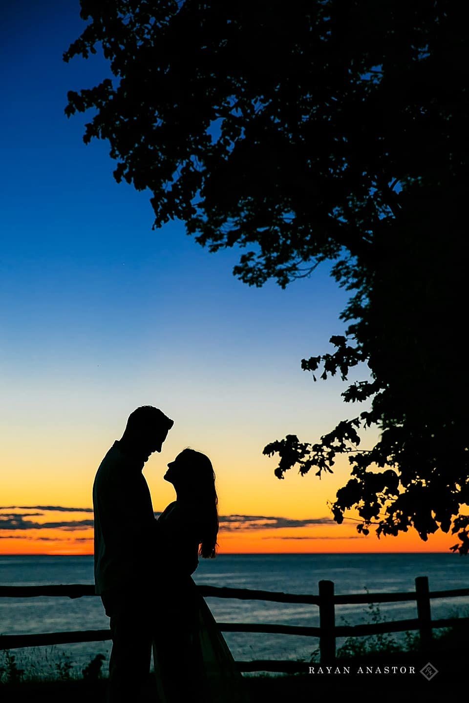 Engagement photos at sunset over lake michigan