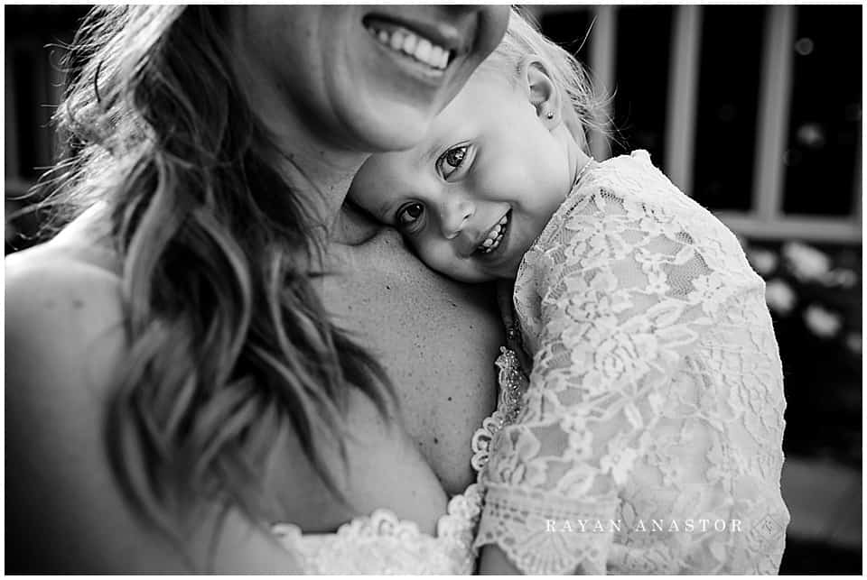 mom and little girl at wedding