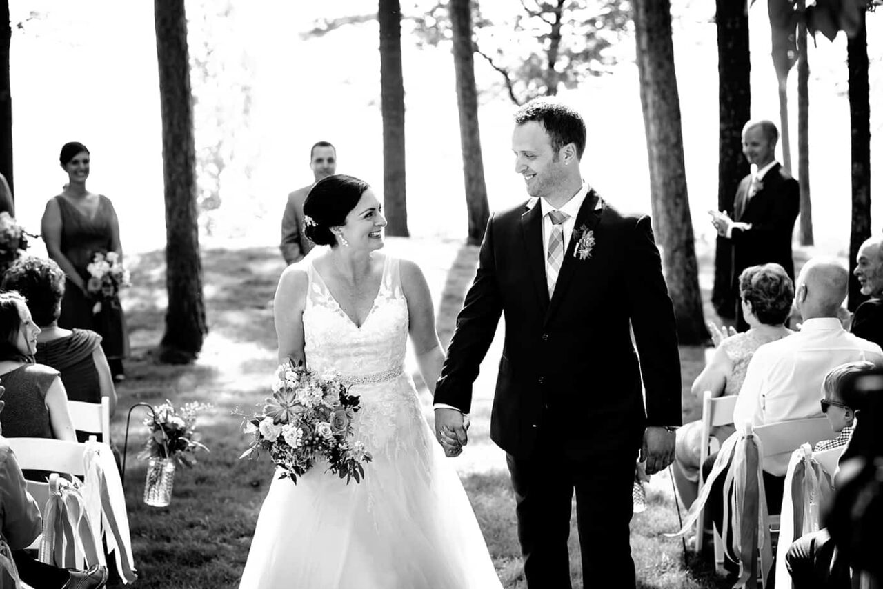 Couple just after being married smiling at each other