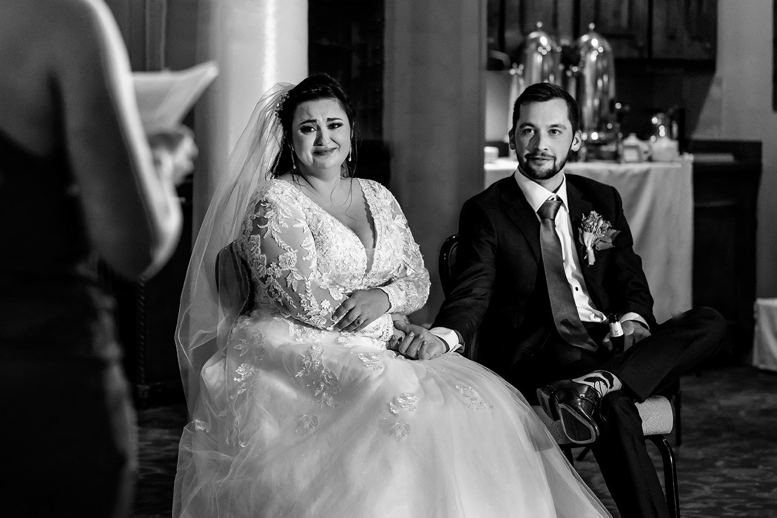 bride and groom crying during toasts at reception