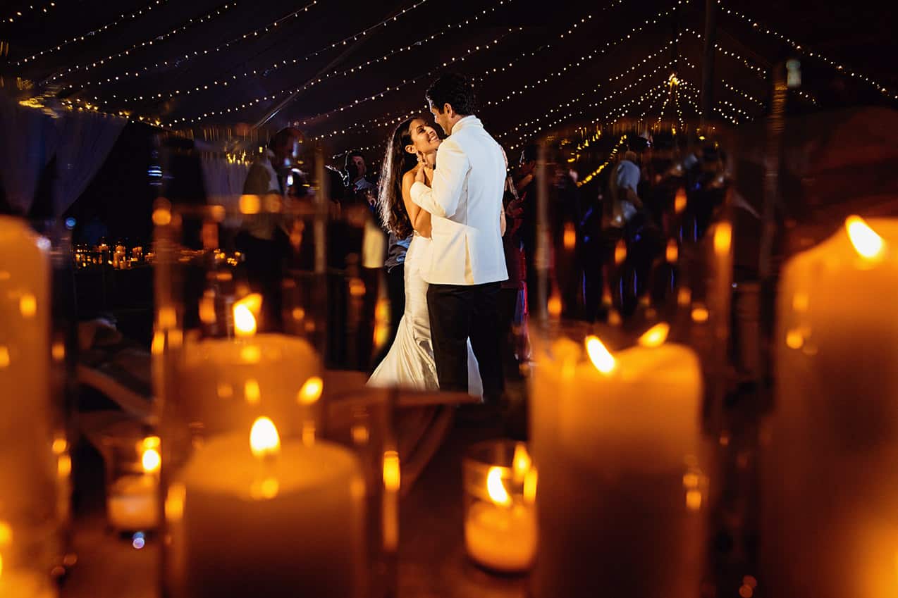 Couple Dancing at Bay Harbor Marina Wedding Reception with candles