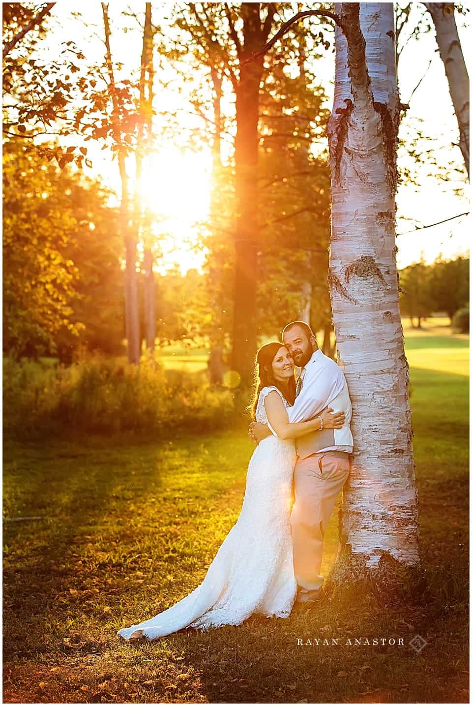 bride and groom portrait at sunset in birch trees