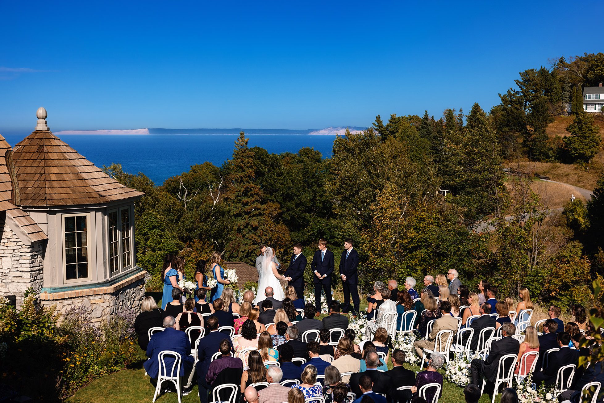 bride and groom getting married overlooking lake Michigan and sleeping bear dunes