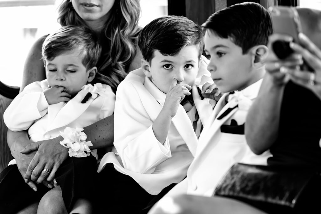 Ring Bearers picking nose at Marina at Bay Harbor Wedding