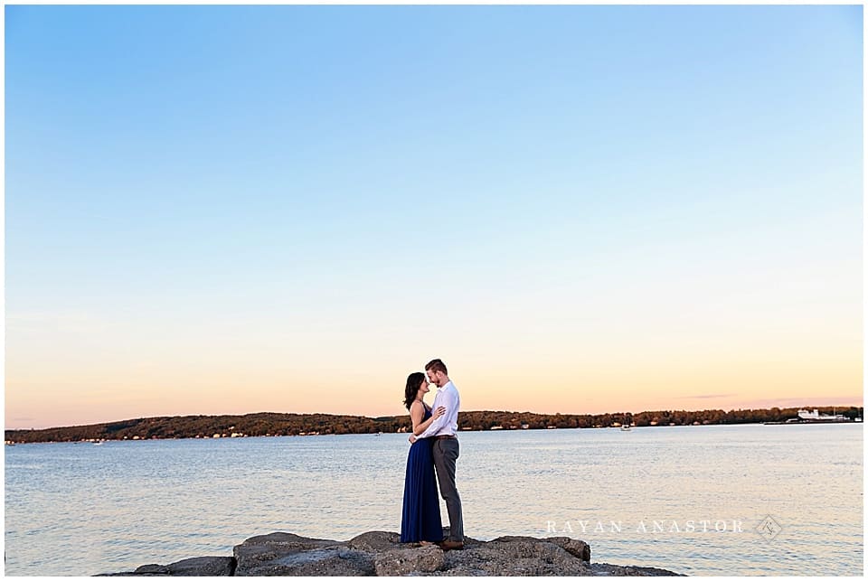 Engagement Photo at Sunset overlooking west grand traverse bay