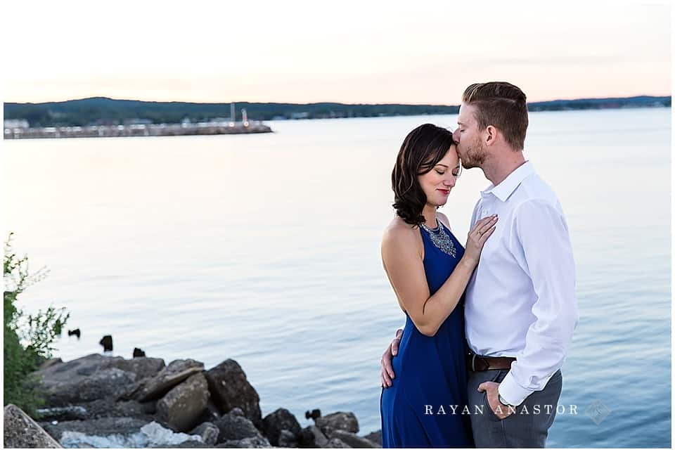 Engagement Photo at Sunset overlooking west grand traverse bay