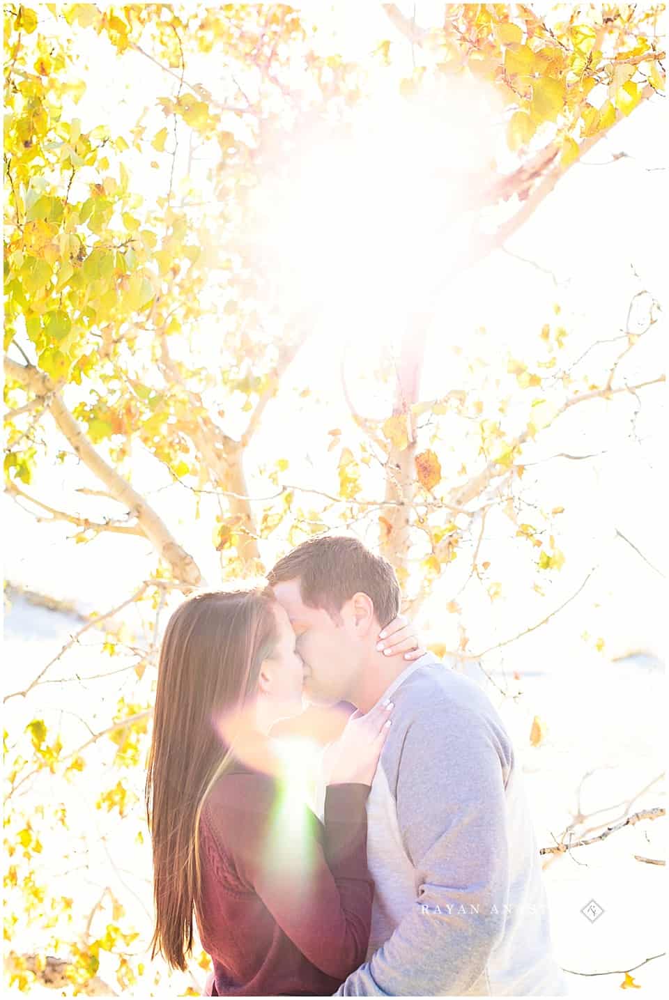 Engagement photos on sand dunes overlooking lake michigan