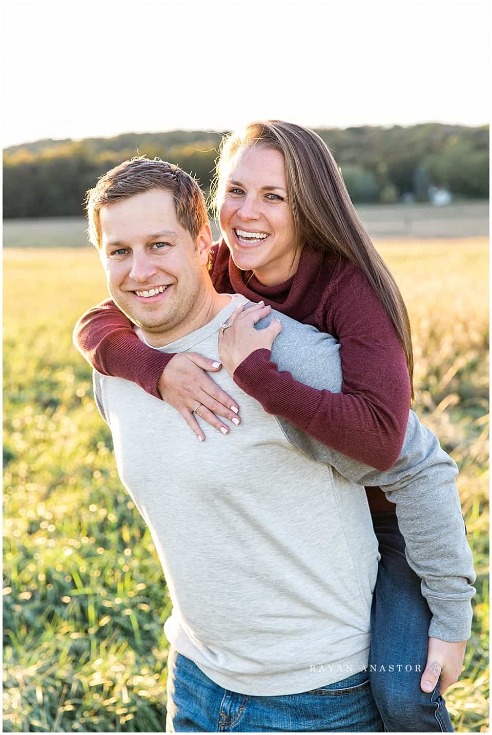 Engagement photos in field at Sleeping Bear Dunes National Lakeshore