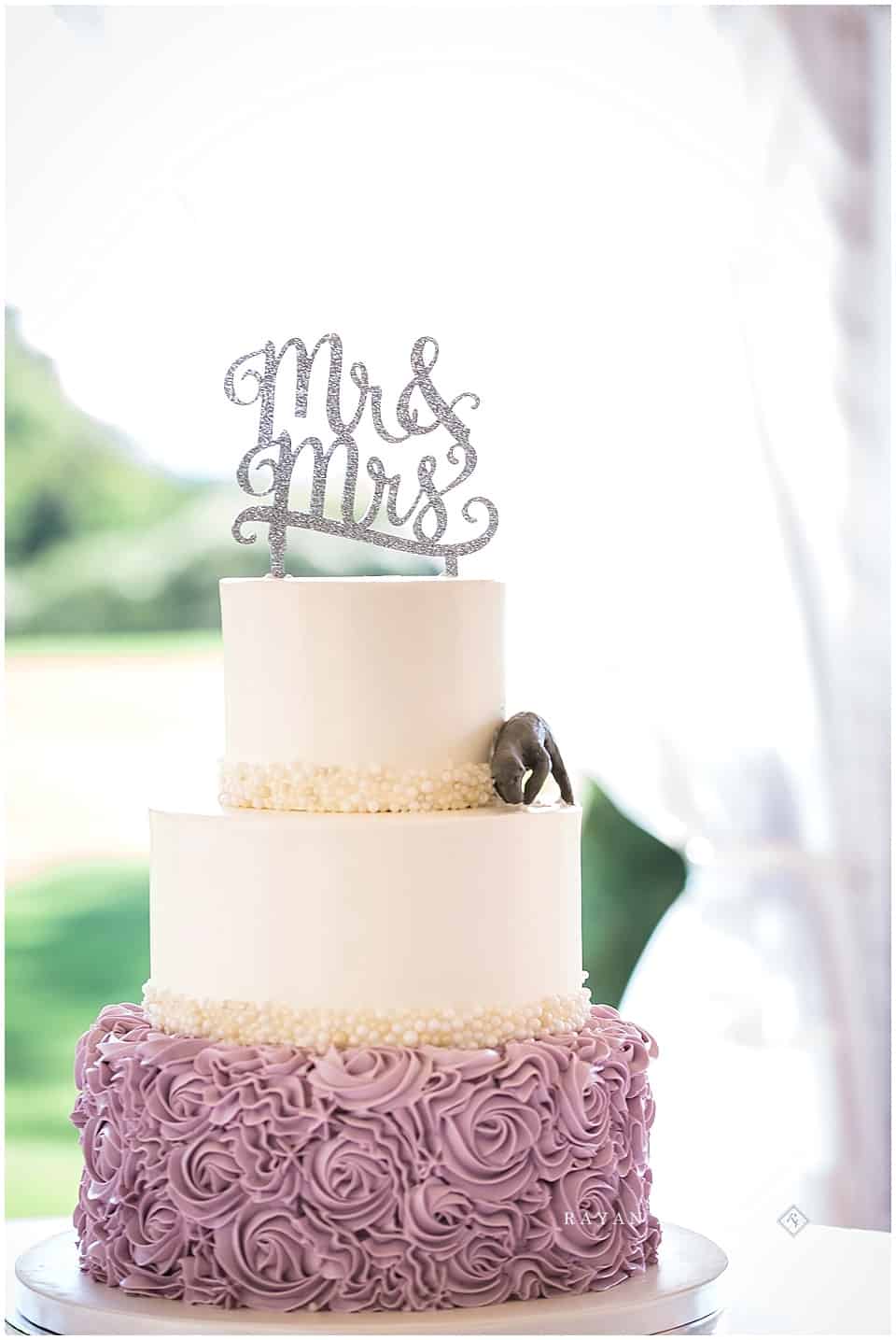wedding cake with purple flowers by bella e dolche