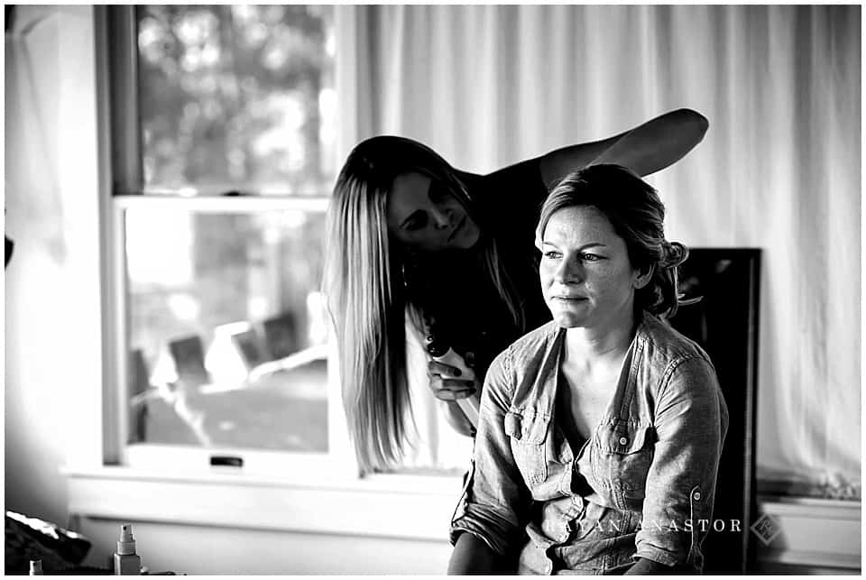 bride getting hair and makeup done in Northport