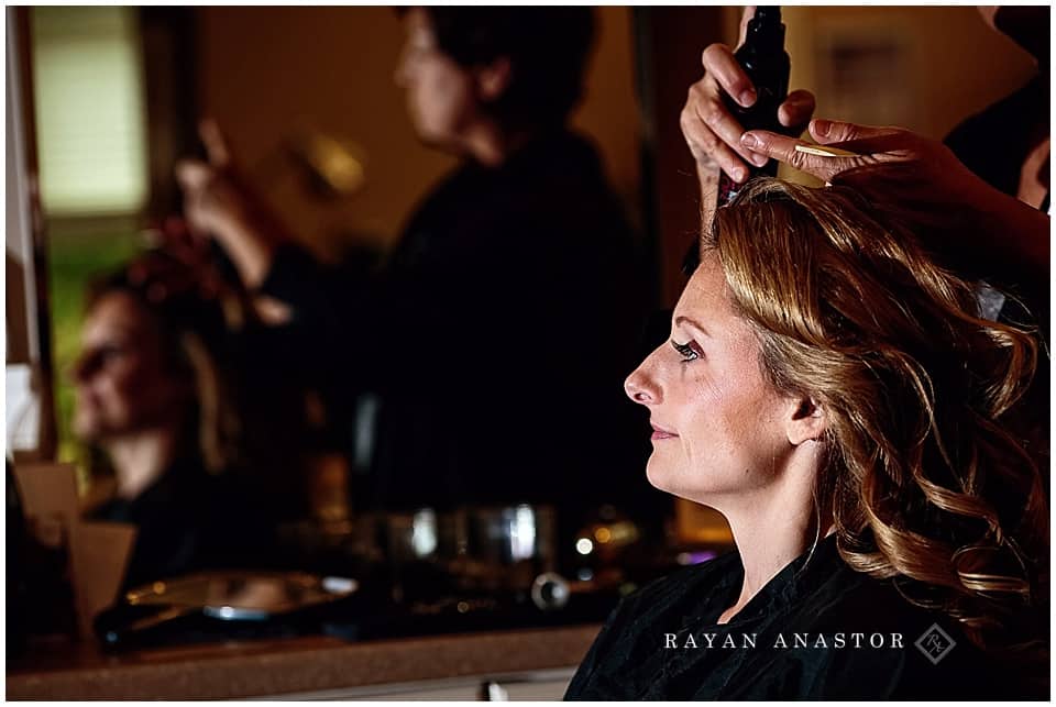 bride having her hair done