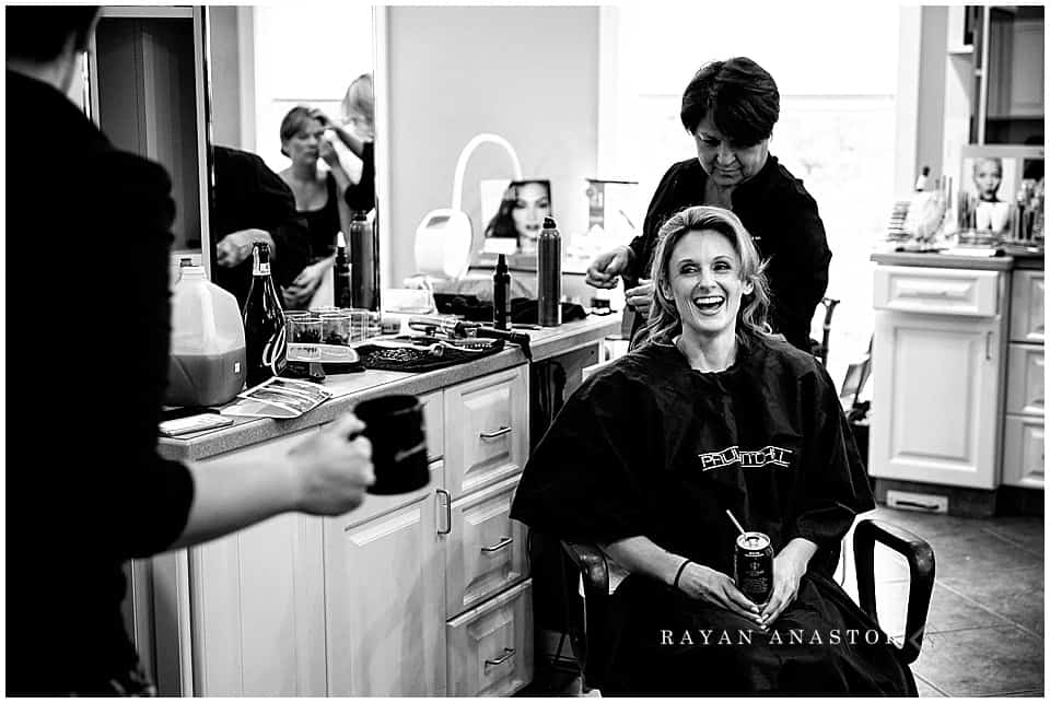 bride having her hair done