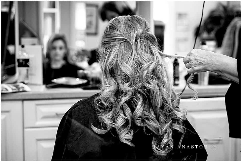 bride having her hair done