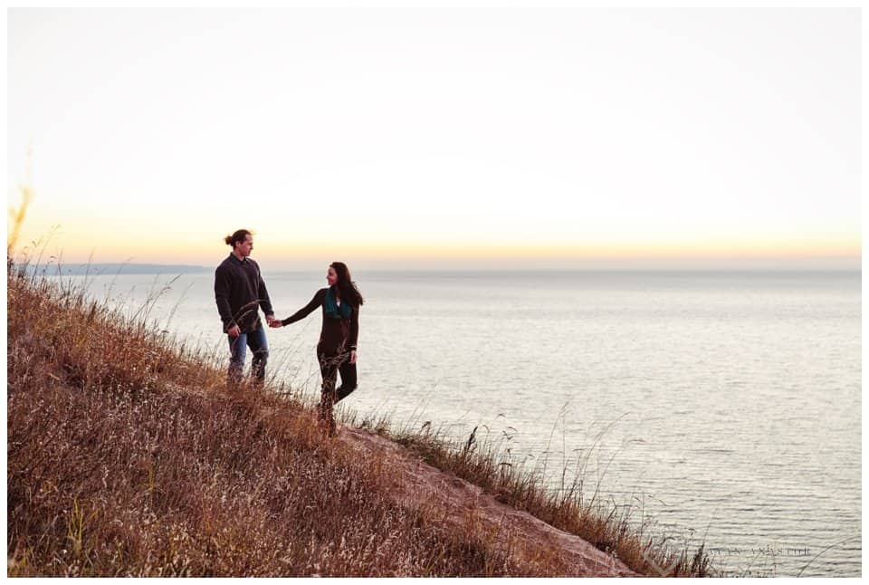 Sunset engagement photos overlooking Lake Michigan