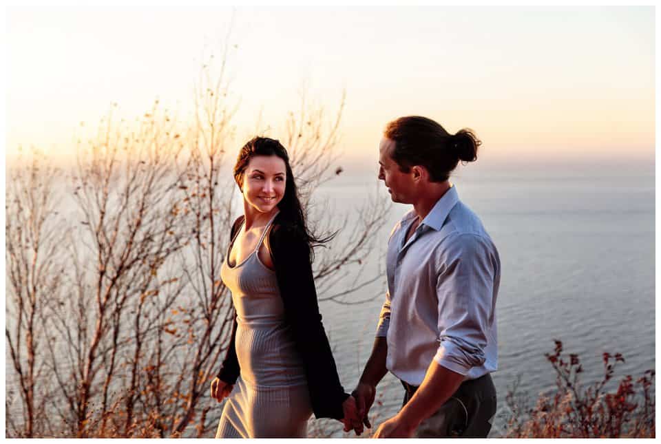 Sunset engagement photos overlooking Lake Michigan