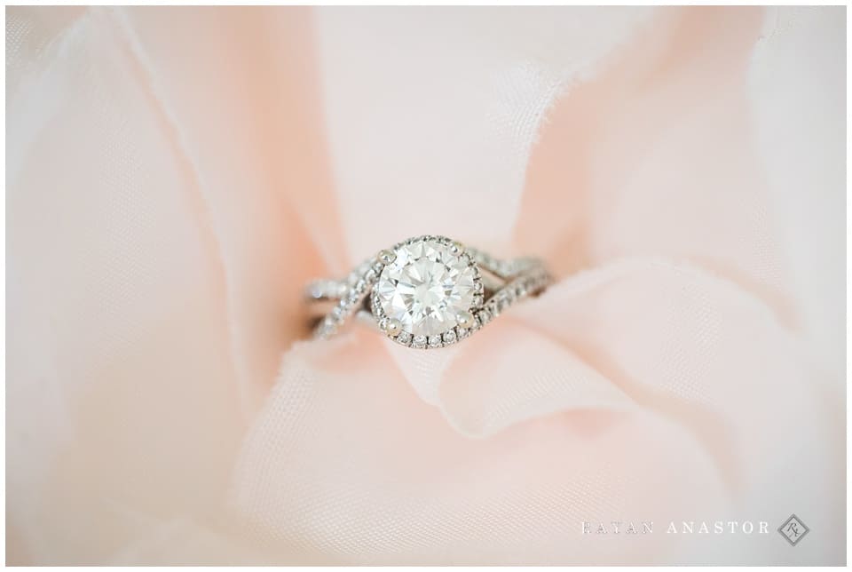engagement ring in a fluff of pink