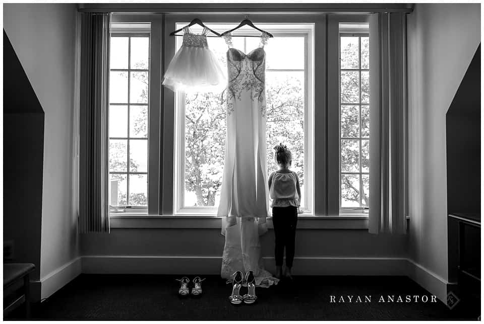 flower girl with brides dress