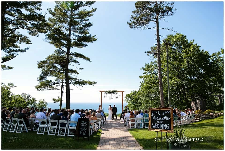 wedding at the homestead with incredible chandelier arch