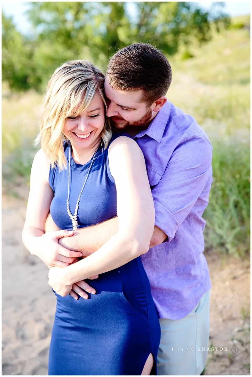 couple engagement photos in sand dunes