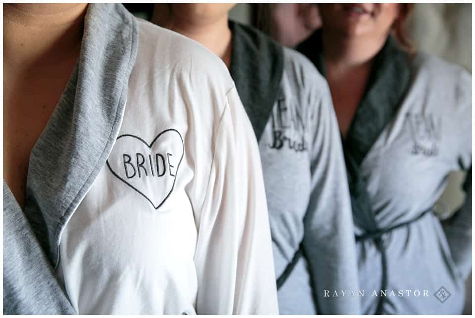 bride and bridesmaids and their robes