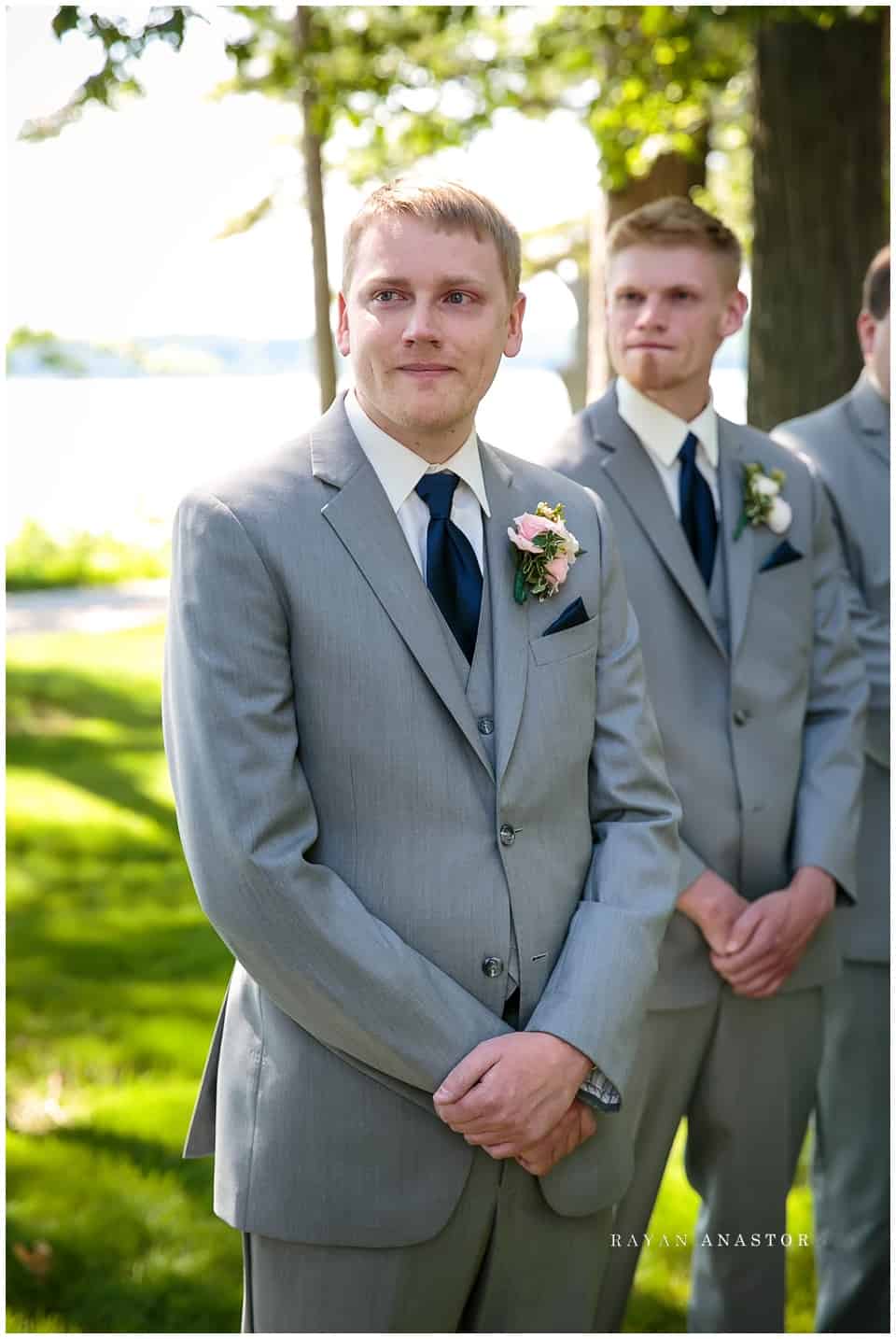 groom crying seeing bride for the first time
