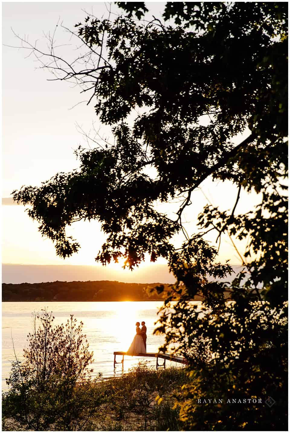 wedding photography at sunset on grand traverse bay