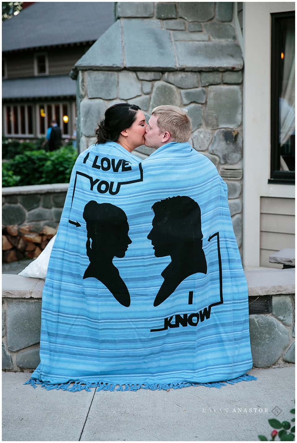 bride and groom with star wars blanket
