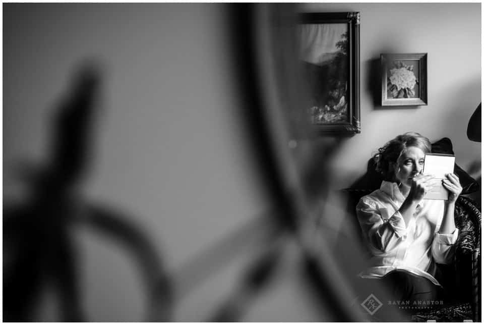 bride getting ready at the Wellington inn in traverse city