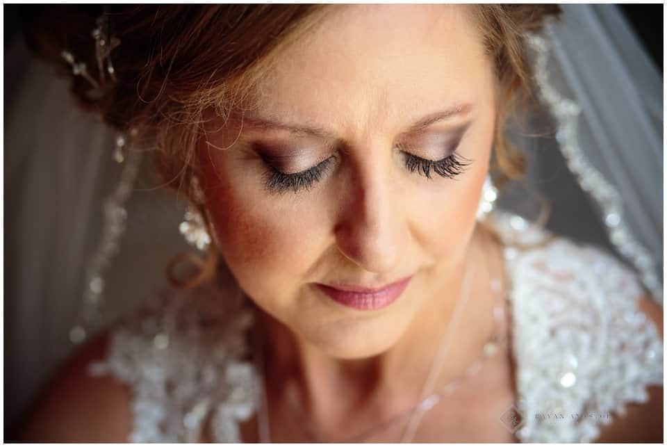 bride getting ready at the Wellington inn in traverse city