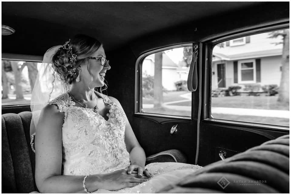 bride in model a car on her way to the ceremony
