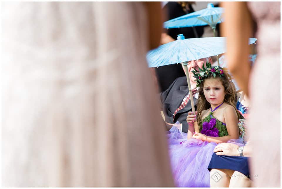 flower girl crying for mom at wedding ceremony